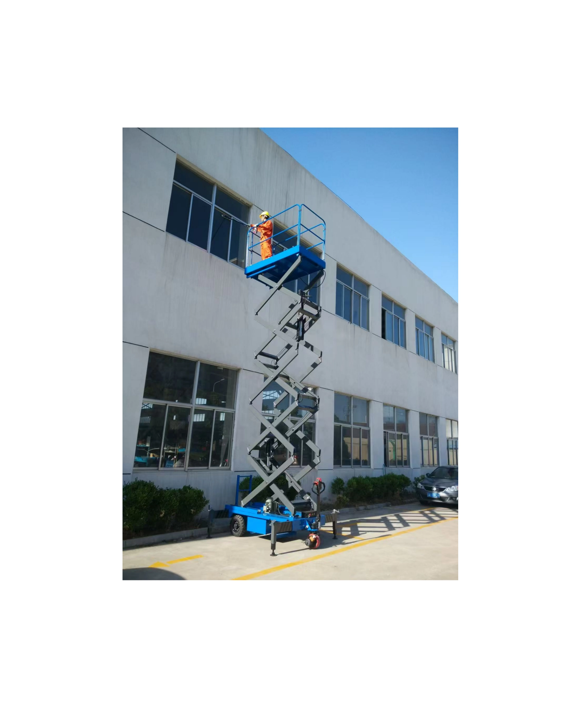 Cleaning on a towable scissor Lift
